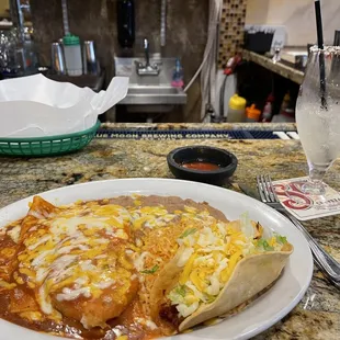 a burrito and a glass of water