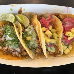 Two chicken &amp; two al pastor tacos