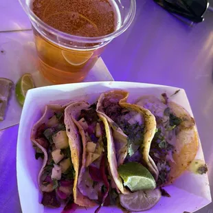 Al pastor w/ pineapple and pickled cabbage, barbacoa w/ onion &amp; cilantro