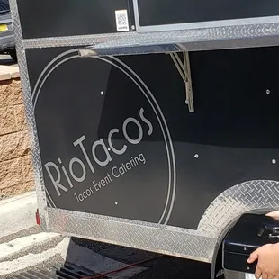 a man working on a food truck