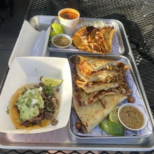 Quesabirria tacos, Rio grande quesadilla, and a carne asada taco