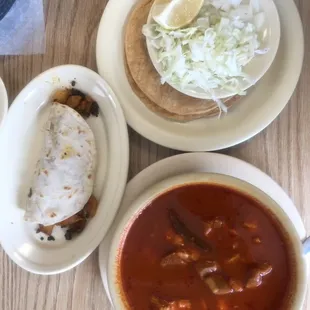 Pozole and chorizo con papas taco