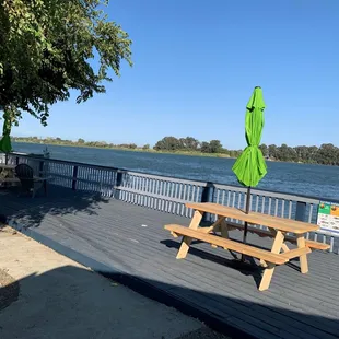 Painted deck new tables and umbrellas