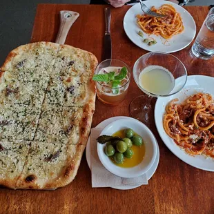 Happy hour! Golden potato pizza, Bucatini Amatriciana, olives