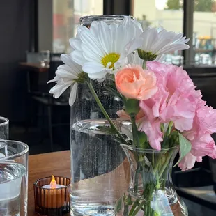 a vase of flowers on a table