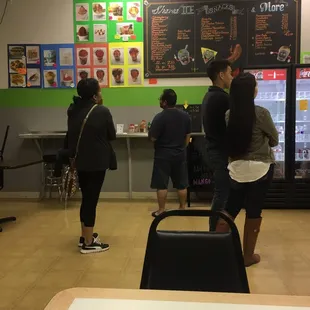 a group of people in a restaurant