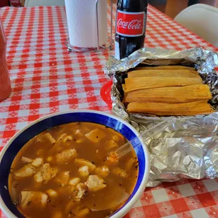 a bowl of soup and a sandwich