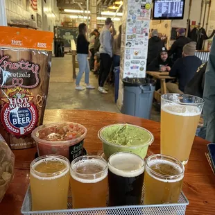 Beer flight , a pint of the Sextant, and Knotty Pretzels