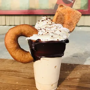 a donut and whipped cream
