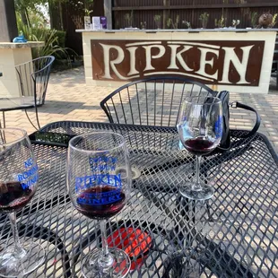 three glasses of wine on a table