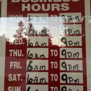 Hours posted on front door