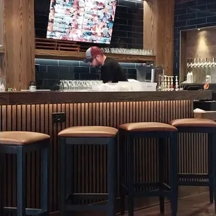 Brewer/Owner Chris below the tap list