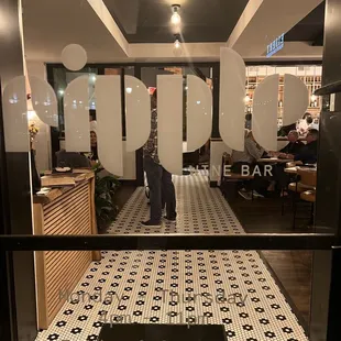 the entrance to the restaurant