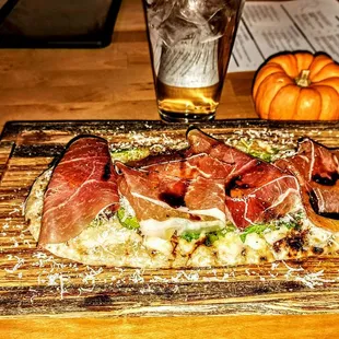 Prosciutto &amp; Arugula Flatbread: Squash, Parmesan, Aged Balsamic. $17