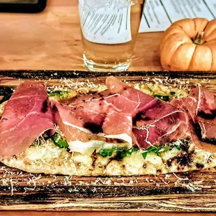Prosciutto &amp; Arugula Flatbread: Squash, Parmesan, Aged Balsamic. $17
