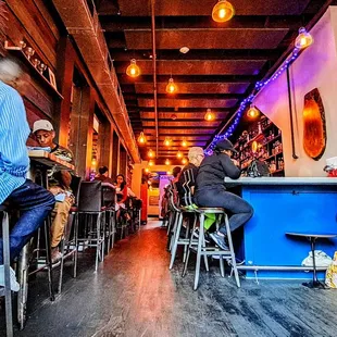 people sitting at the bar