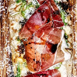 Prosciutto &amp; Arugula Flatbread: Squash, Parmesan, Aged Balsamic. $17