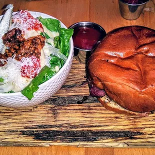BURGER w/ Caesar Salad: gouda, lebanon bologna, special sauce. $17