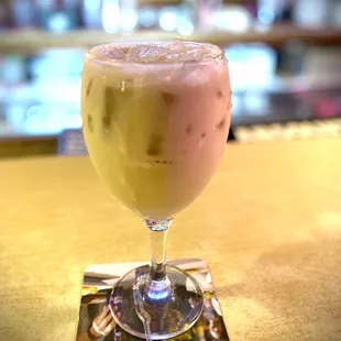 a drink in a wine glass