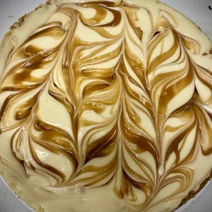 a cheesecake with caramel swirl