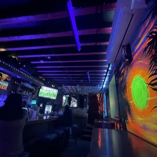 a bar with neon lights