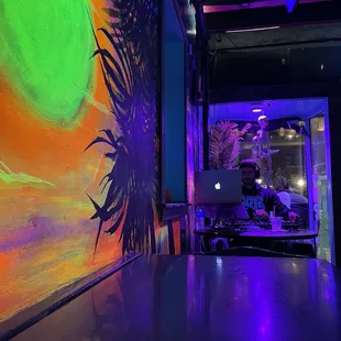 a large painting of a sun