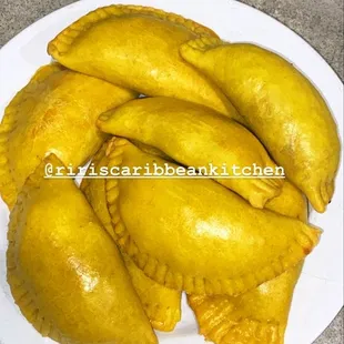 a plate of empanadas