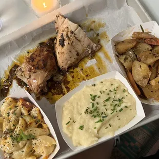 Rotisserie Chicken with Mac Five Cheese mashed potatoes and Roasted Farmer&apos;s Market Seasonal Vegetable.