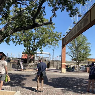 a group of people standing in front of a building
