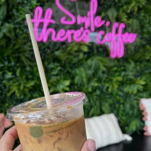 6/27/23 iced latte $6 + cute photo wall