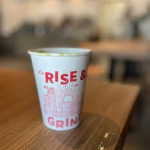 a cup of coffee on a table