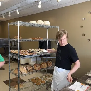 two bakers working in a bakery