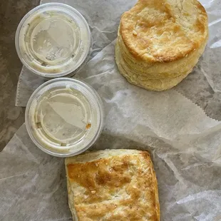 Two biscuits, Machego biscuit, and two sides of gravy.