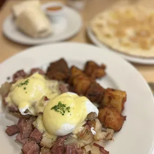 breakfast burrito, corned beef hash eggs Benny, 1/2 order banana Mac nut pancakes with coconut syrup   IG: @ohmyono