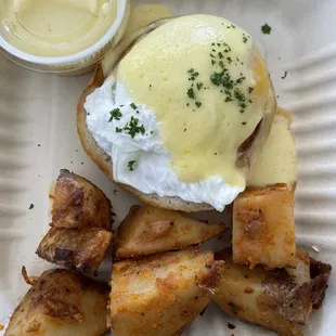 Half order traditional eggs bene with extra hollandaise on the side