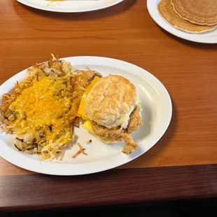 Tenderloin Egg N Cheese and loaded Hash Browns!