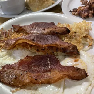 Bacon, hash browns, eggs over easy