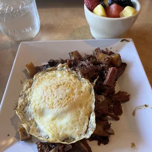 Corned beef hash, egg over medium and fruit cup ordered from sides mens.