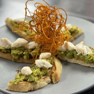 Avocado toast points with jumbo lump crab