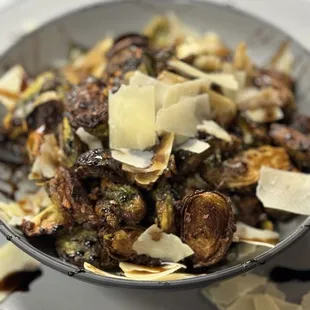 Pan roasted Brussel sprouts with balsamic glaze and shaved Parmesan