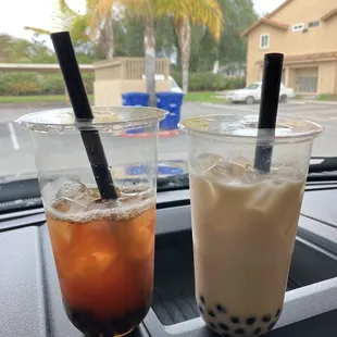 (Left to right)  24oz Passionfruit flavored tea w/ boba 24oz Mango milk tea w/ boba