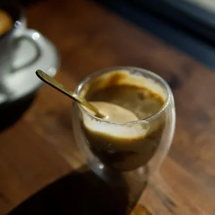 a cup of coffee on a table