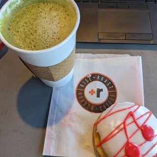 Tasty strong flavor matcha latte with oat milk, and a cherry vanilla .