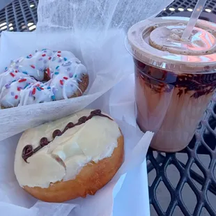 Medium iced mocha, a blueberry lavender cake donut and a banana chocolate yeast donut
