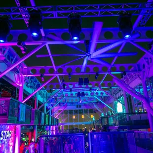 a view of the roof of a building at night