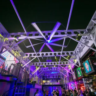 a view of the roof of a building at night