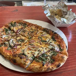 a slice of pizza on a plate