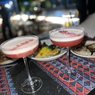 Dama Blanca tequila cocktail with lavender flowers drizzled atop the foam