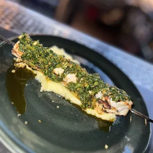 Swordfish skewer- very steak like fish w/chimchurri sauce atop over cheesy grits