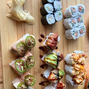 Yellowtail Roll (top), Spicy Tuna Roll (top R), Alba Roll (8pc) (bottom L), Pacific Rim (8pc), Spicy Scallop Roll (6pc) (bottom R)